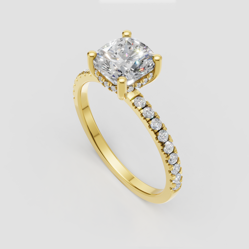 Cushion cut diamond engagement ring with four prong setting