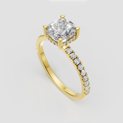 Cushion cut diamond engagement ring with four prong setting