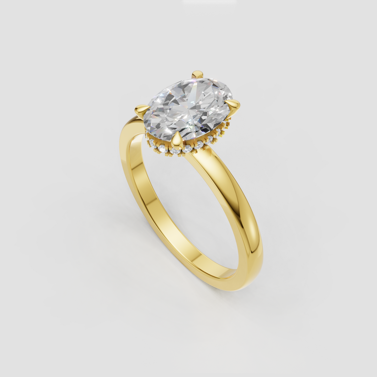 Yellow gold oval diamond engagement ring with hidden halo setting