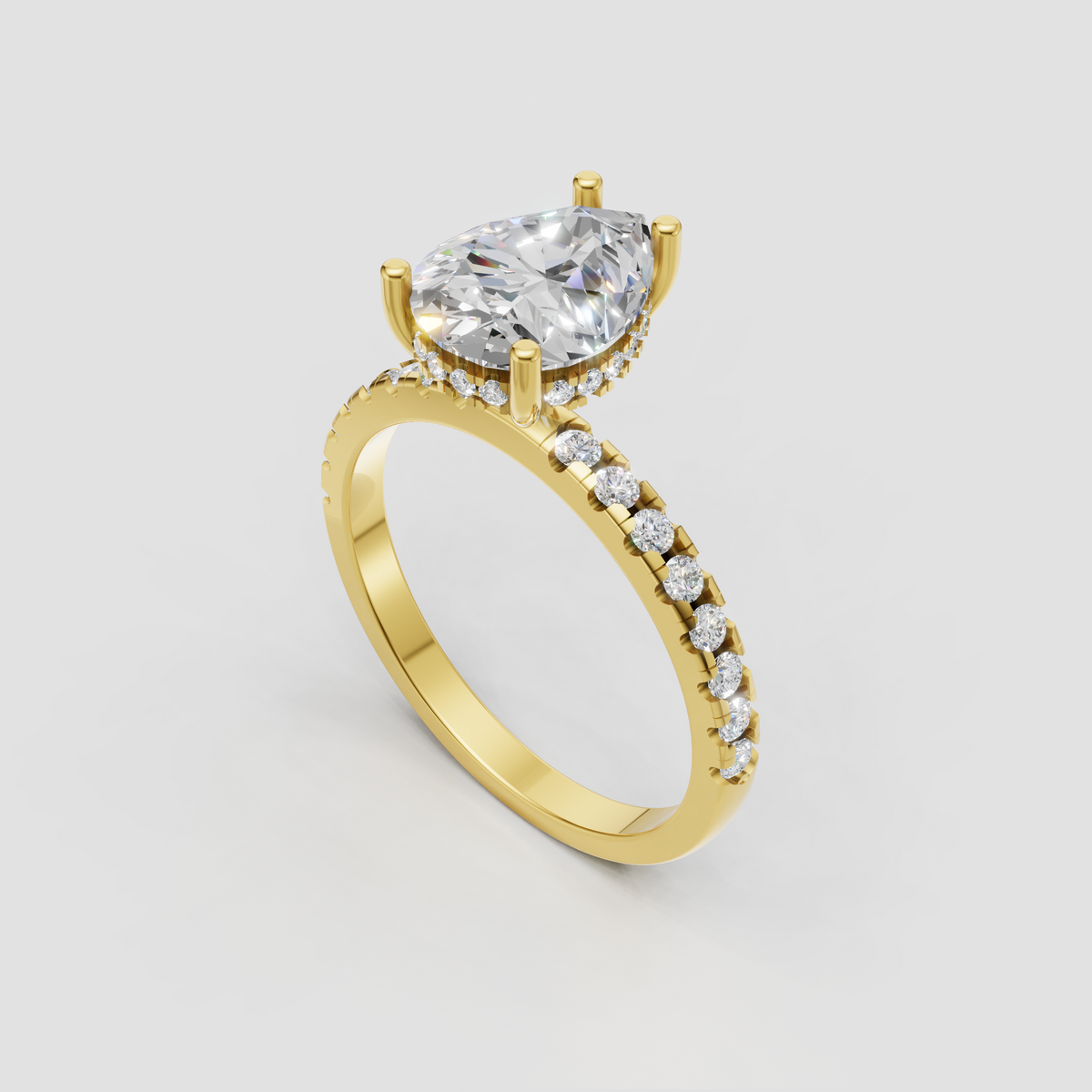 Pear shaped diamond ring in polished yellow gold