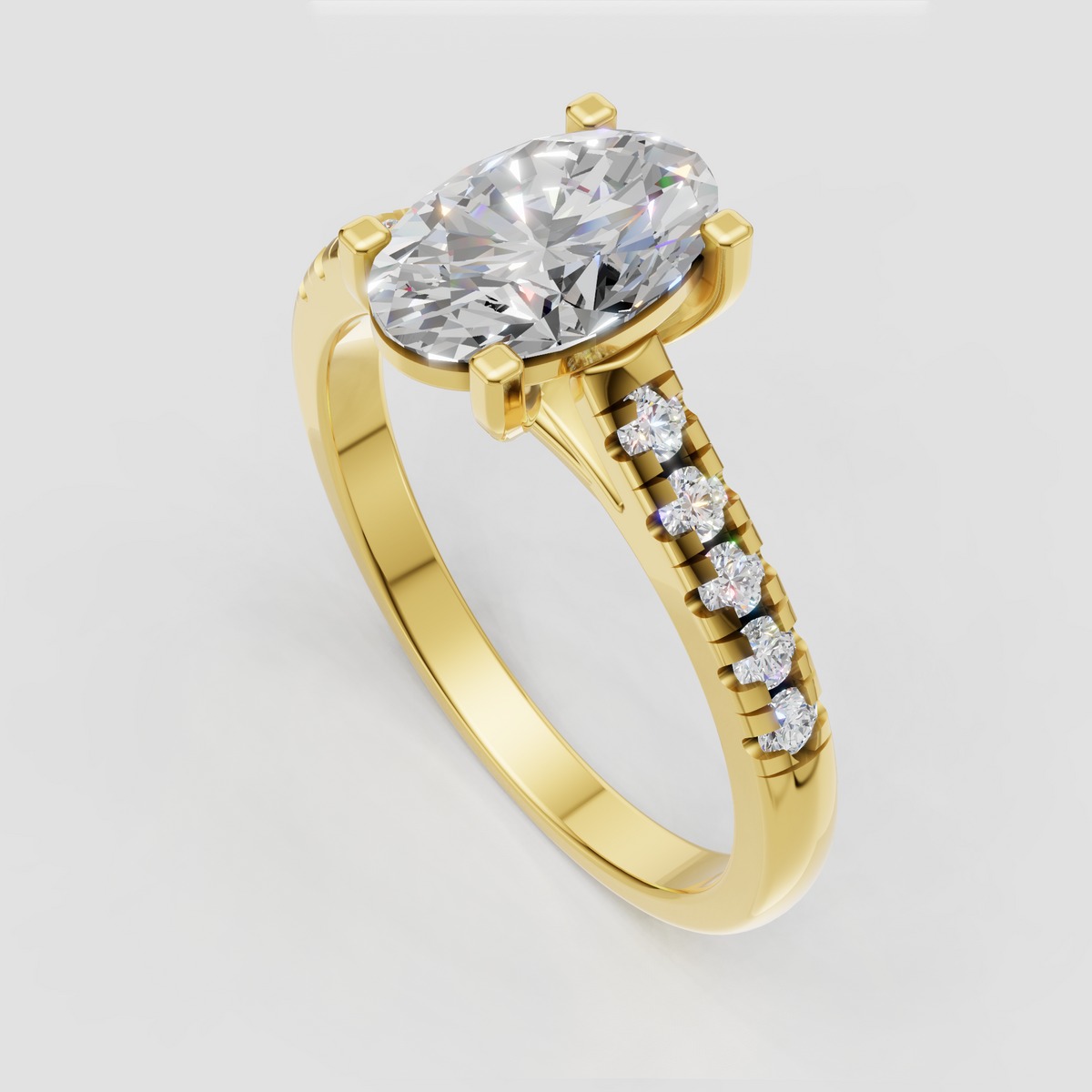 Yellow gold oval diamond engagement ring with four-prong setting