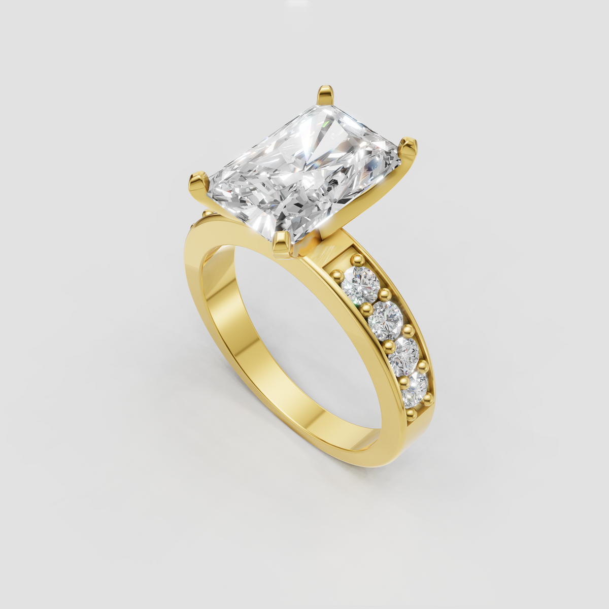 Radiant diamond engagement ring with polished yellow-gold setting