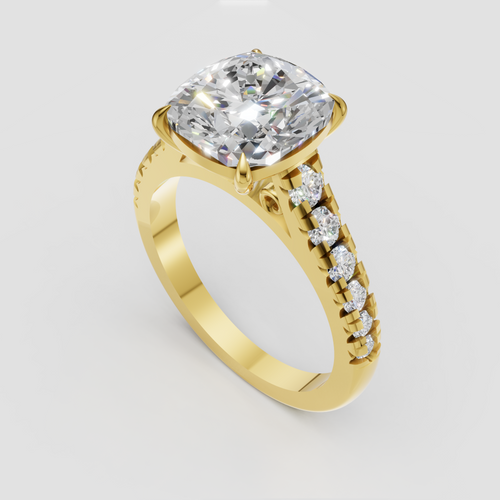 Cushion cut diamond ring with four-prong setting and pave band