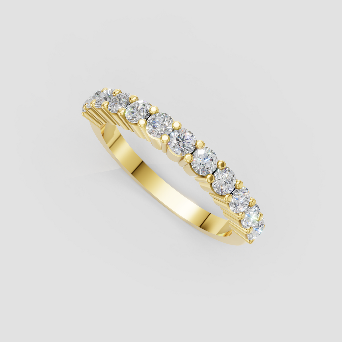 Yellow gold round diamond eternity ring featuring continuous brilliant-cut stones