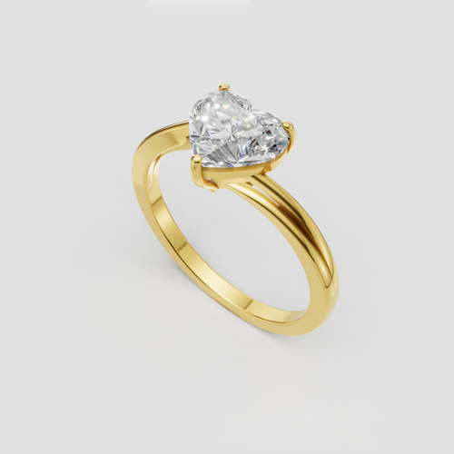 Heart shaped diamond ring featuring a sleek polished yellow gold band