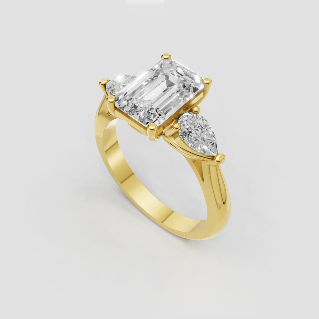 Yellow gold emerald cut three stone engagement ring