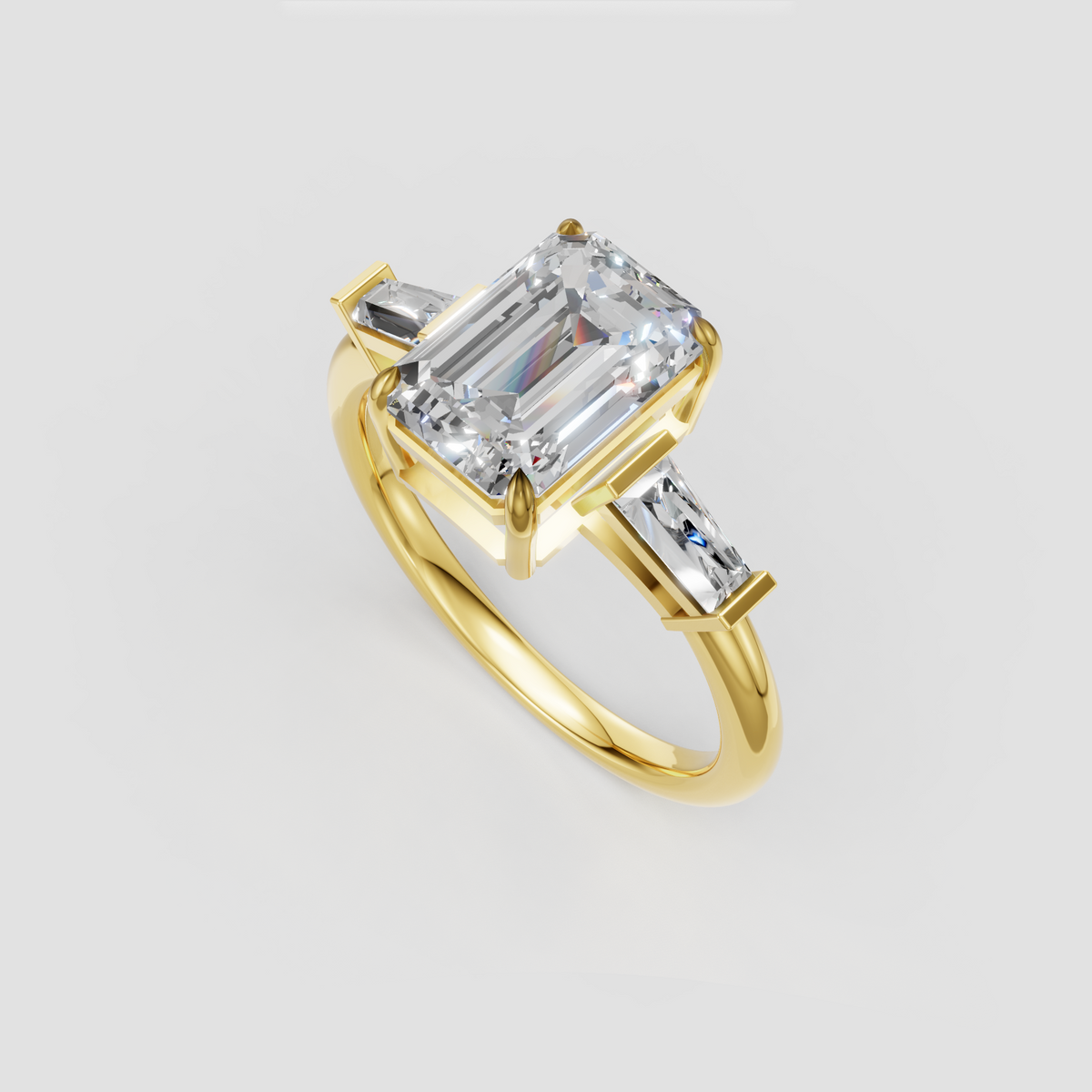 Emerald cut diamond engagement ring with baguette accent stones and polished gold band
