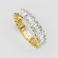 Emerald cut diamond eternity ring with gold prong setting