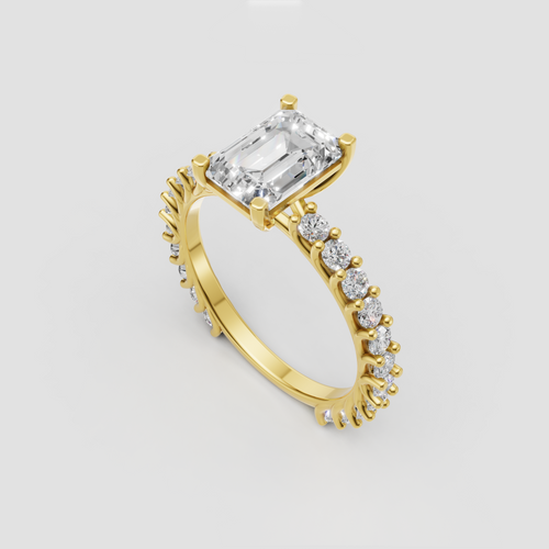Emerald cut diamond ring with round pave side stones