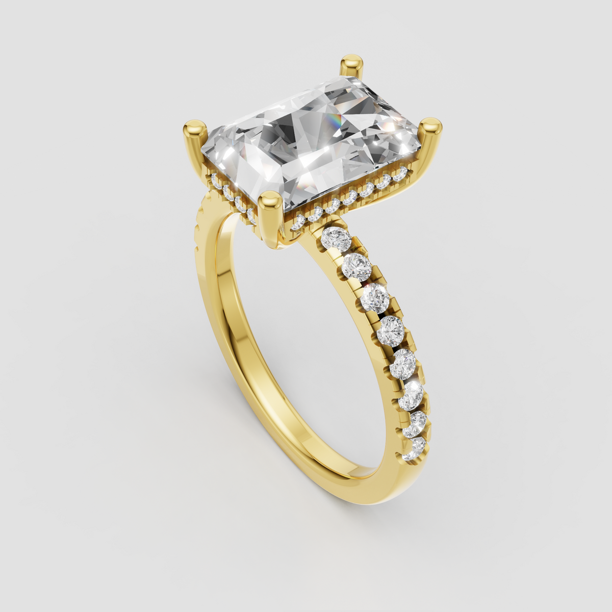 Elongated radiant cut diamond ring with hidden halo and pavé shoulders