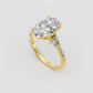 Oval cut diamond ring in polished yellow gold