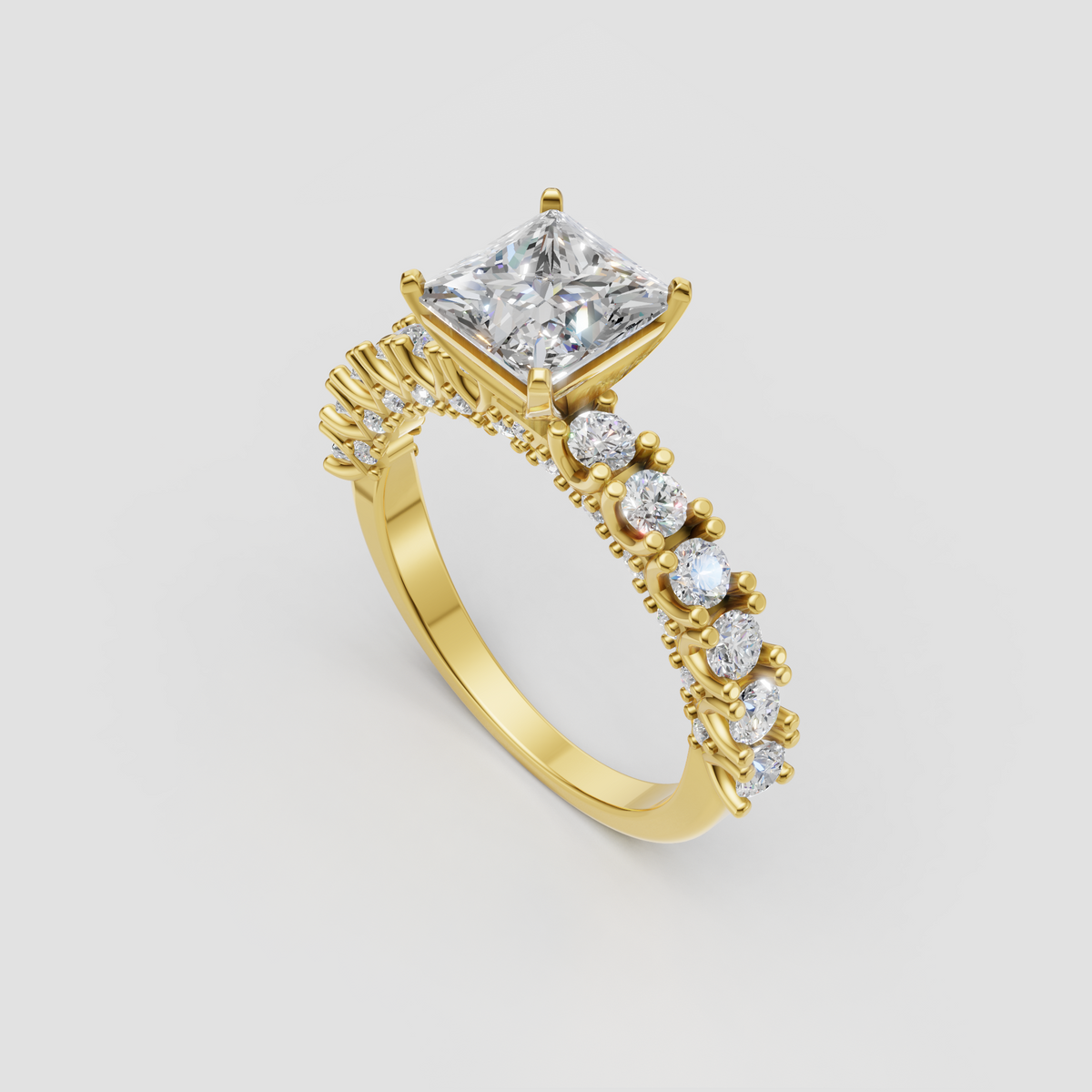 Yellow gold princess diamond ring with four-prong center setting