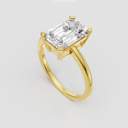 Emerald cut yellow gold engagement ring