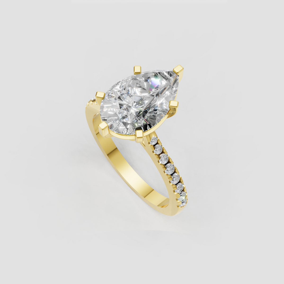 Yellow gold pear cut diamond engagement ring