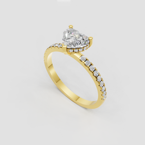 Heart cut diamond ring in polished yellow gold