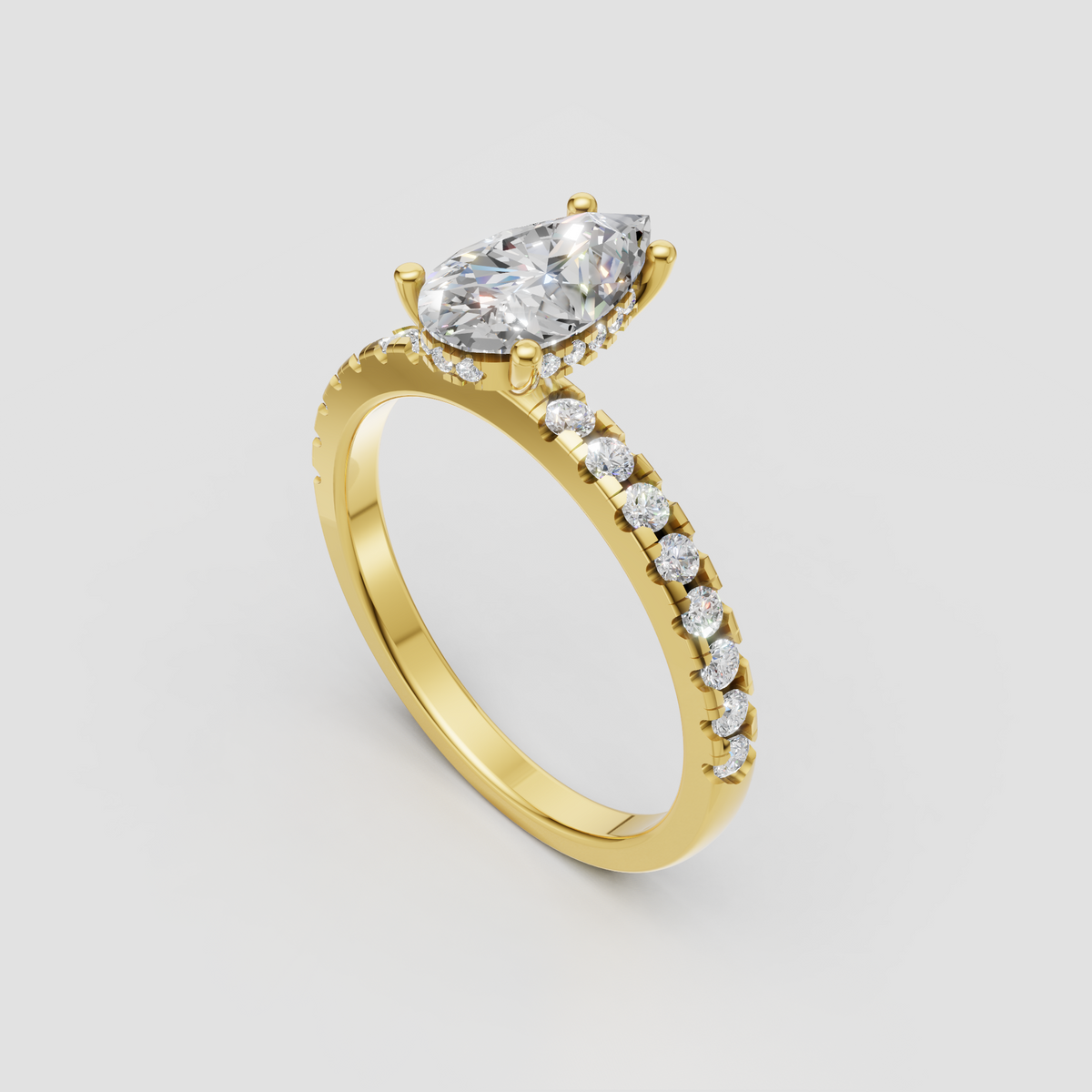 Pear shaped diamond engagement ring with hidden halo setting