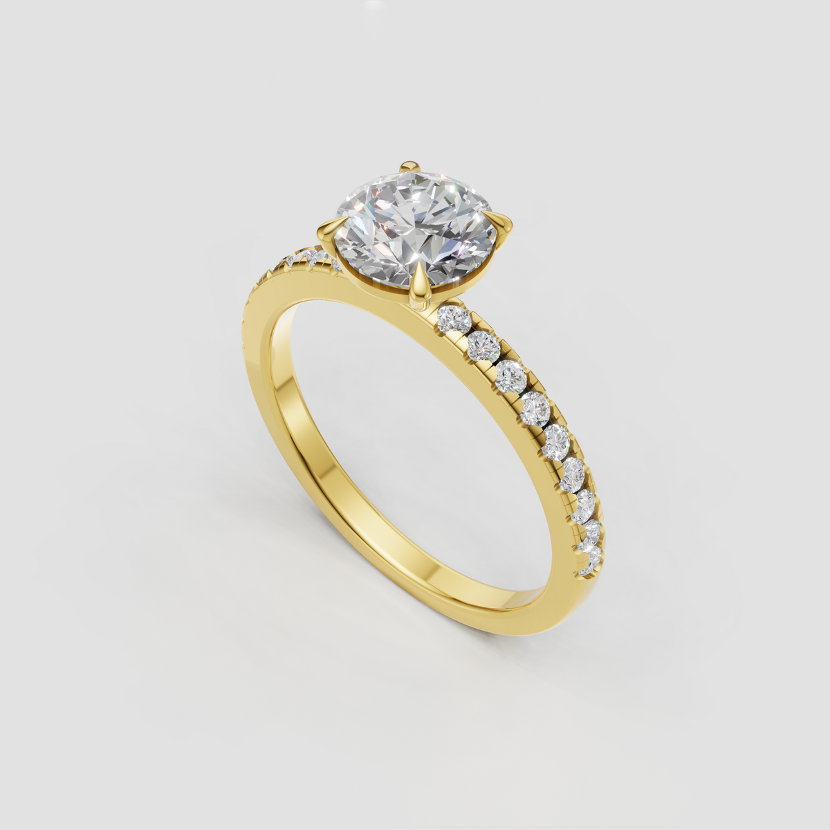 Round Diamond solitaire engagement ring with pavé band and four claw prongs