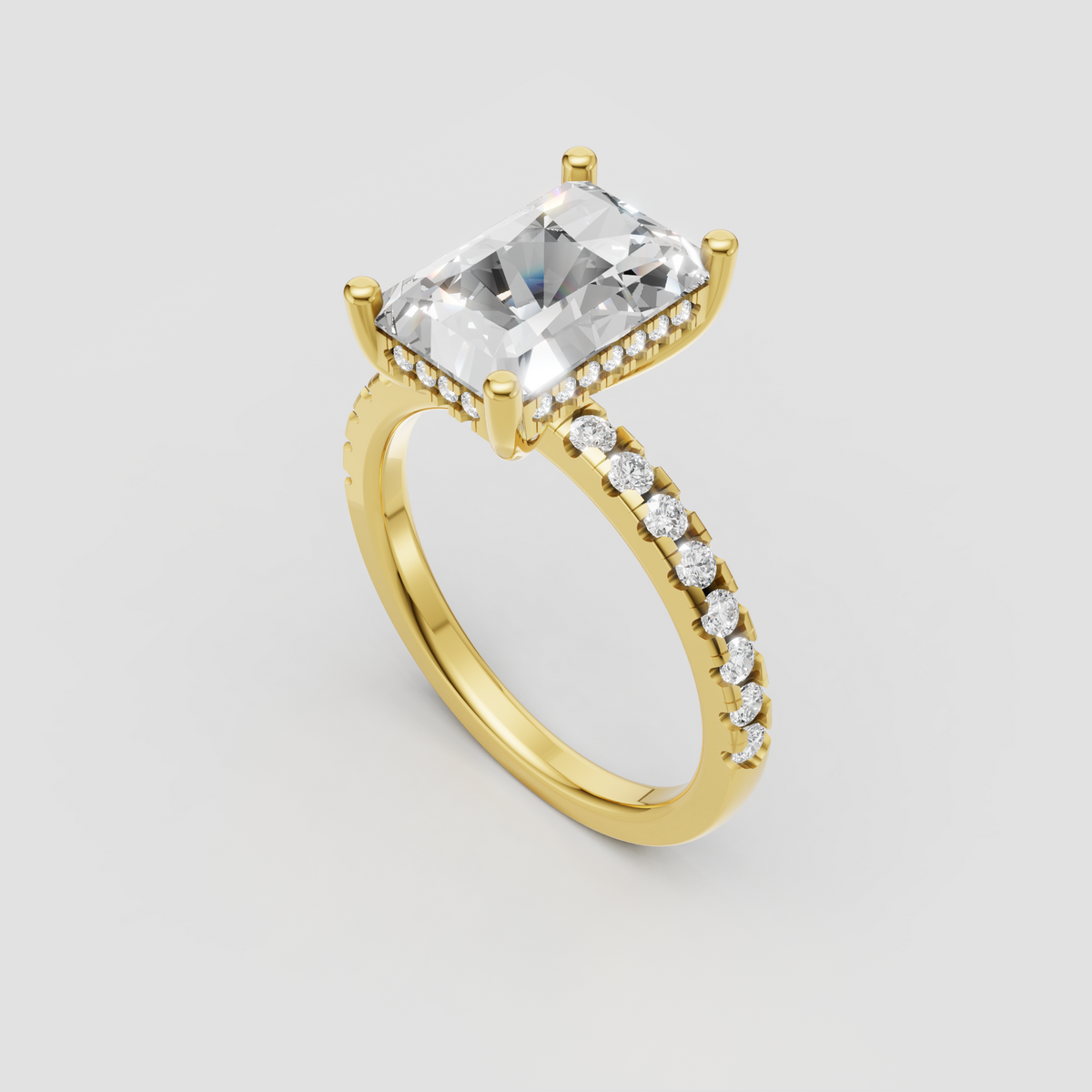 Radiant cut diamond engagement ring featuring a hidden halo setting