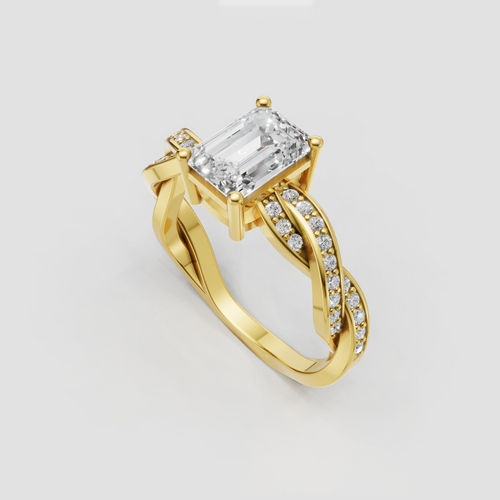 Emerald cut diamond ring in yellow gold