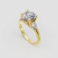 Round diamond engagement ring with pear-shaped side stones