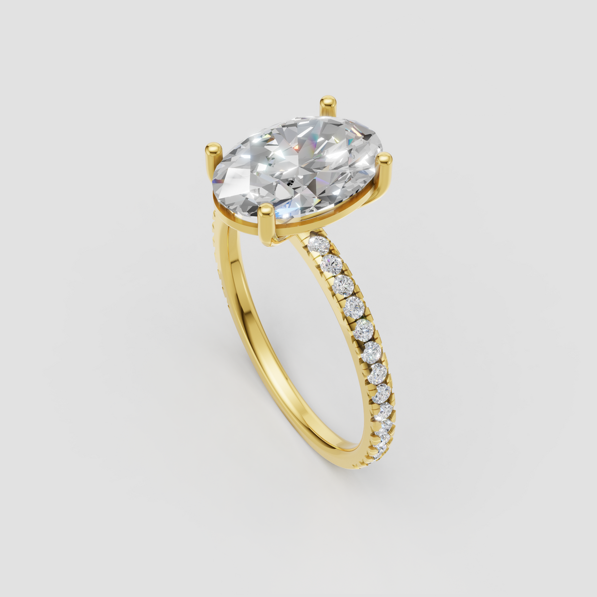 Oval center stone engagement ring with sparkling pavé shoulders