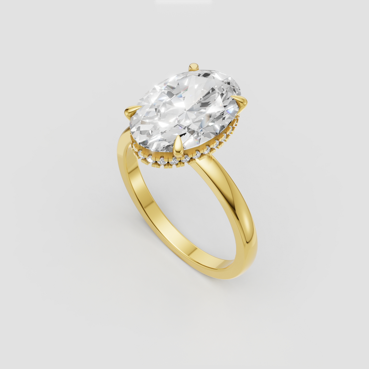 Yellow gold oval diamond ring with hidden halo