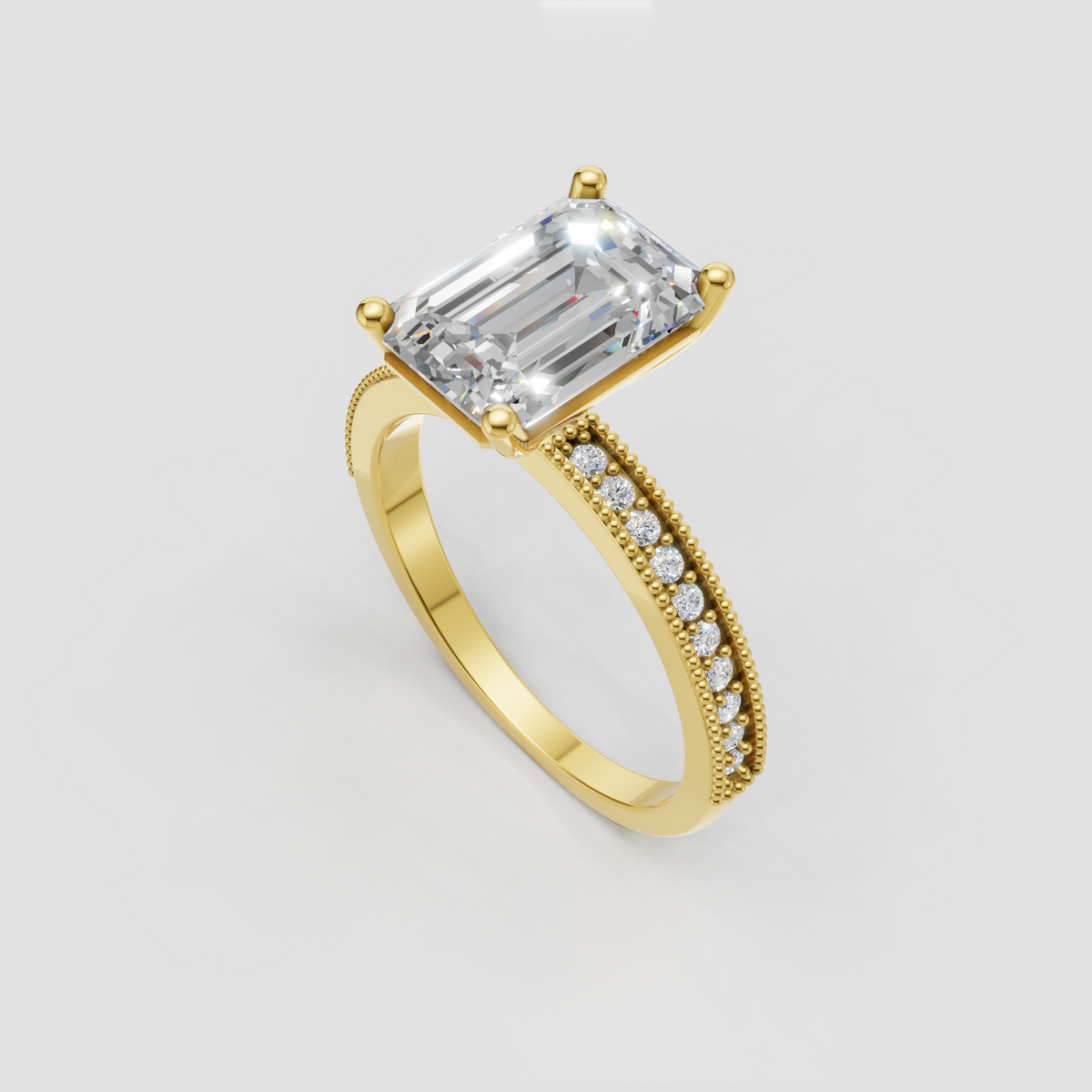 Emerald cut Diamond engagement ring with four prong setting and round side stones