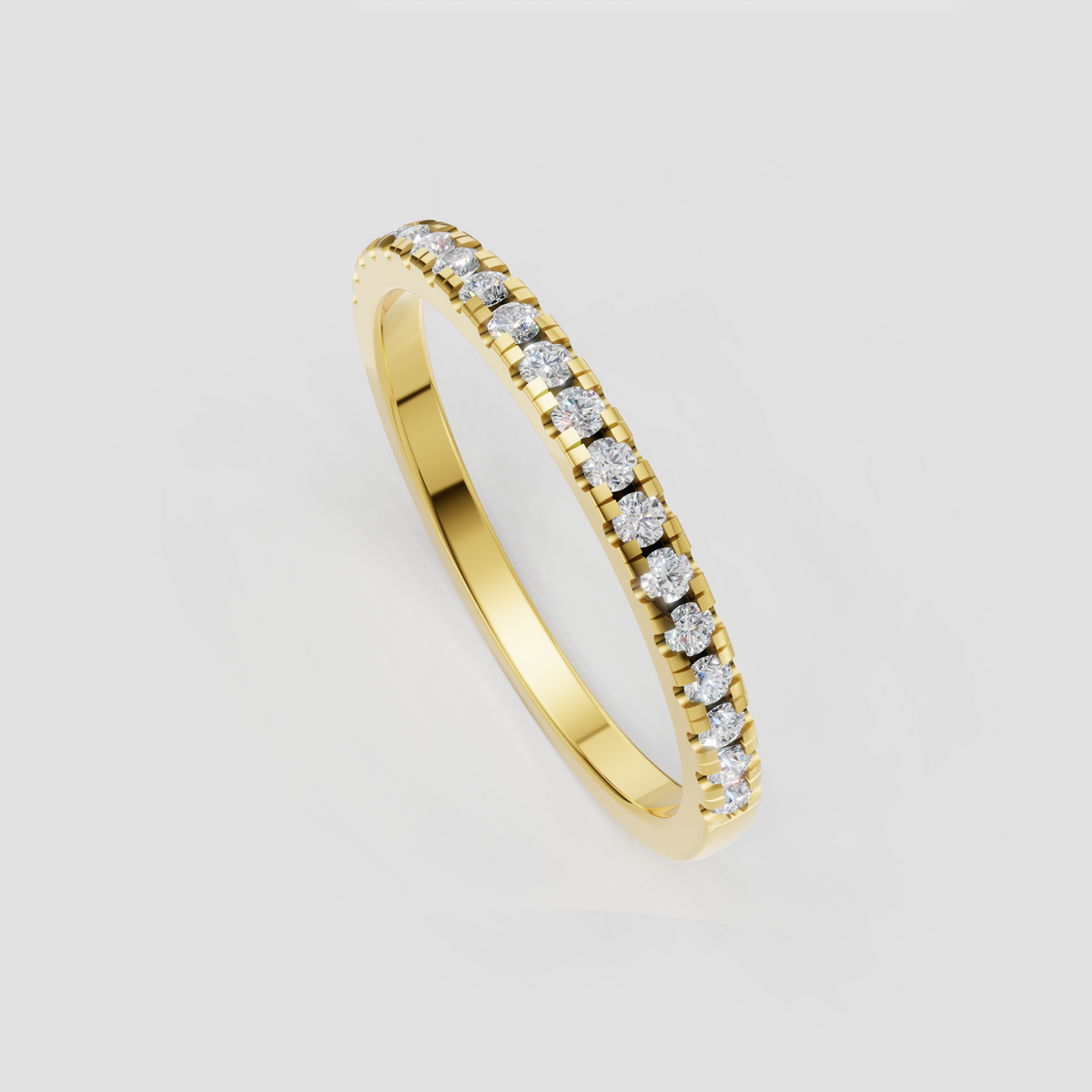 Round diamond half eternity ring with sleek gold channel setting