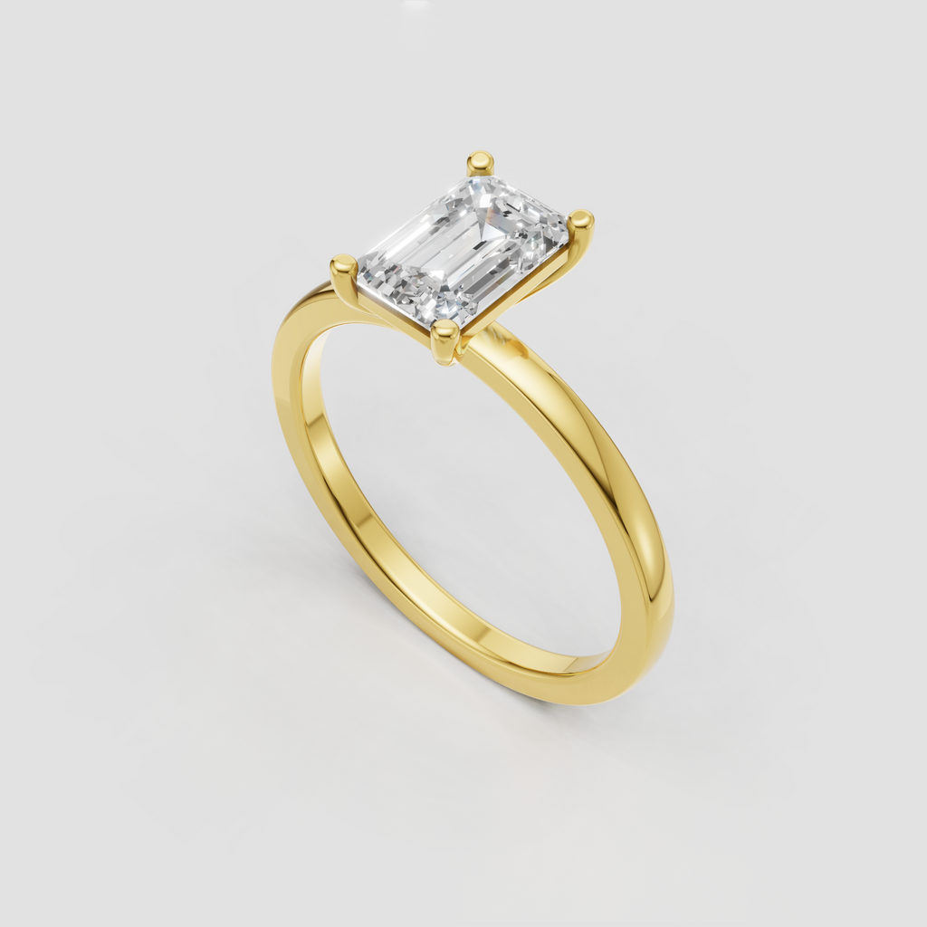Emerald cut diamond ring with four prong setting