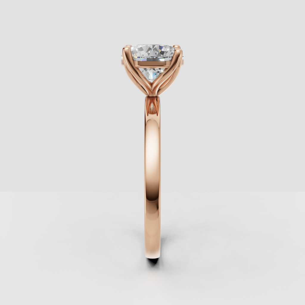 Round cut diamond ring with graceful curved cathedral shoulders