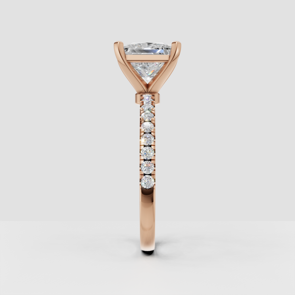 Modern princess cut diamond solitaire with polished gold band