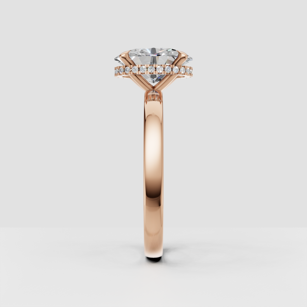 Oval diamond solitaire ring with delicate hidden halo setting