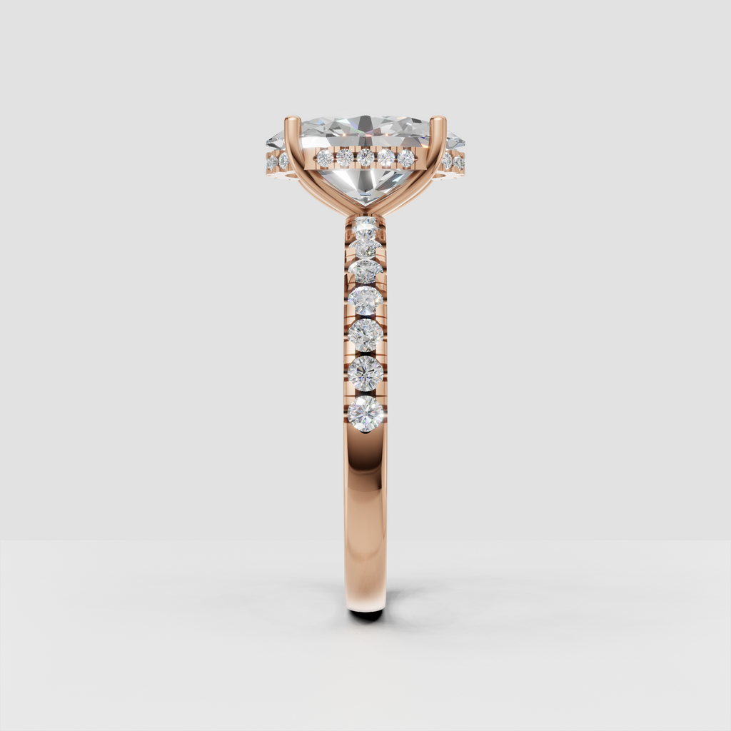 Side view of pear cut diamond engagement ring showing elevated cathedral setting