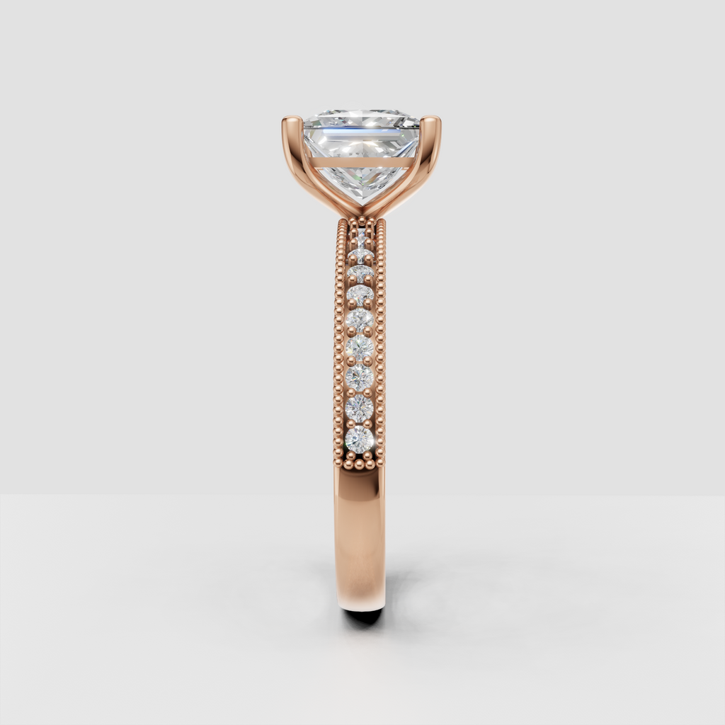 Princess diamond engagement ring showcasing brilliant center stone and pavé shoulders