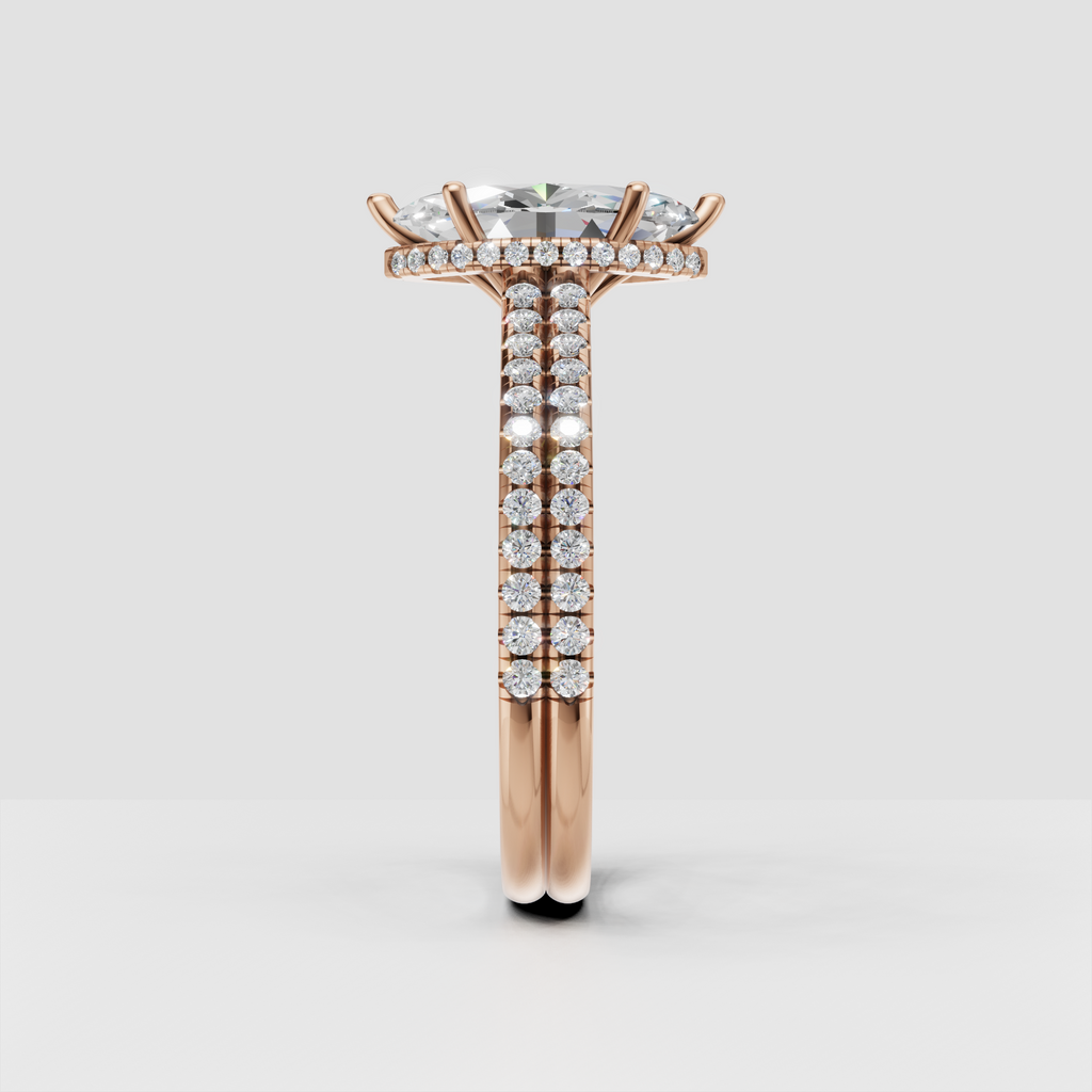 Front view of marquise diamond ring with multi-prong setting and pavé band