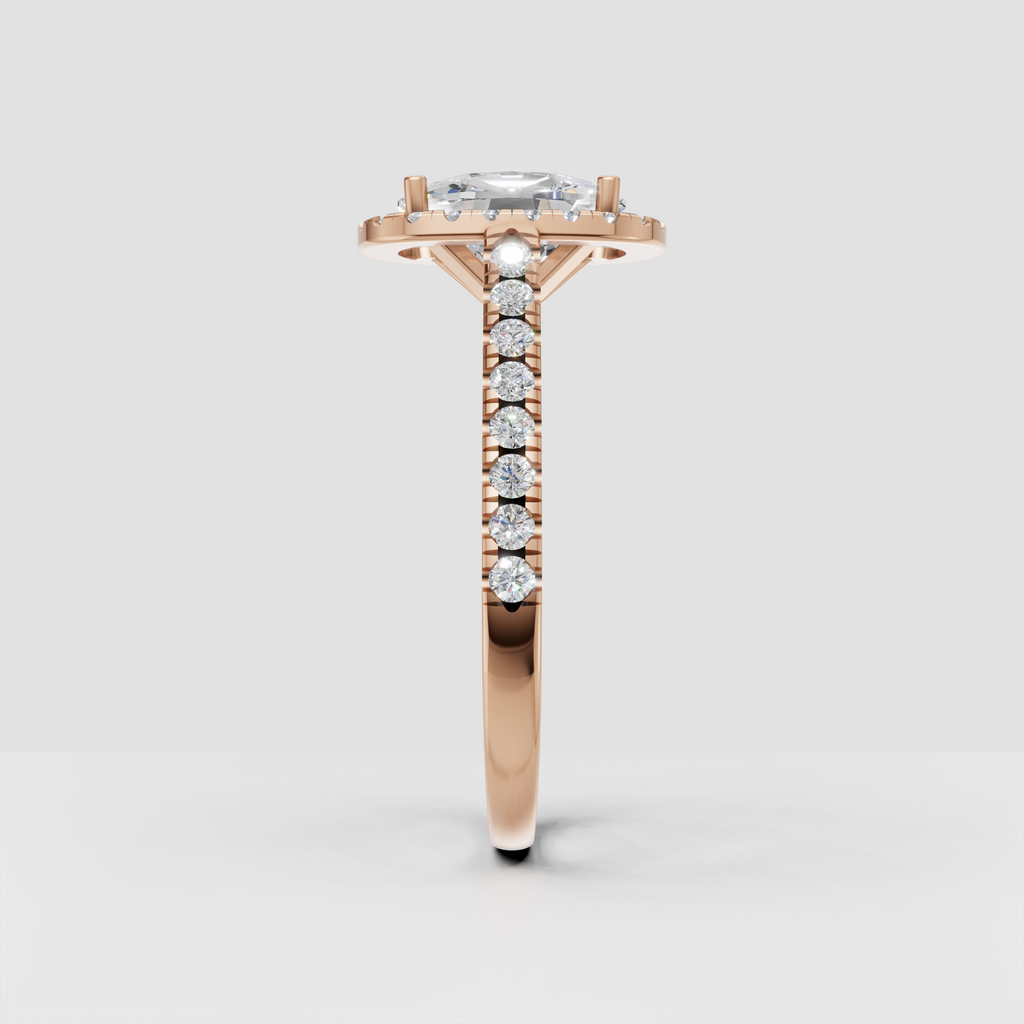 Cushion cut diamond engagement ring with elevated cathedral gallery and halo