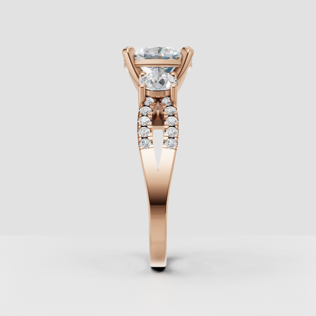 Three stone oval diamond ring with brilliant pavé band detailing