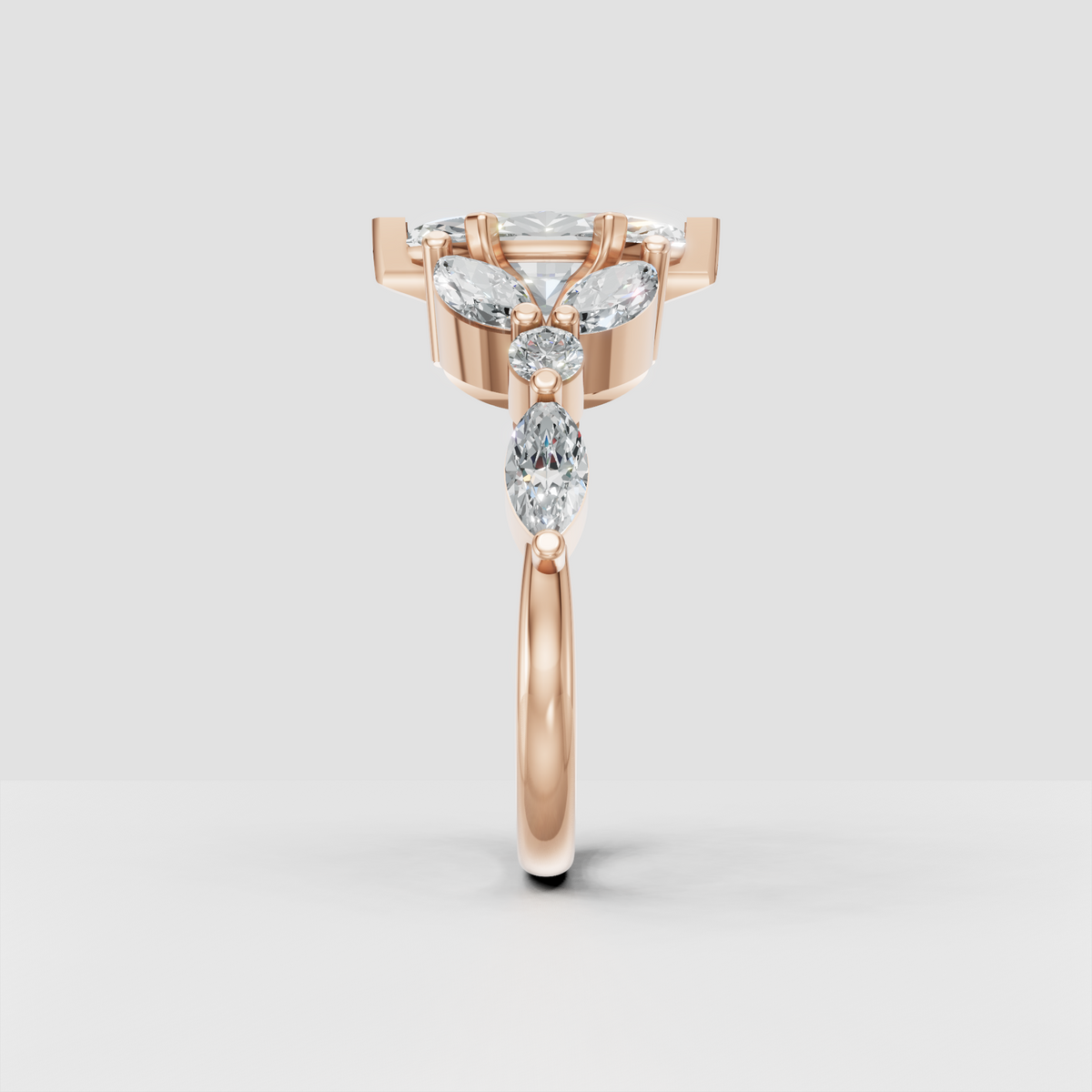 Marquise diamond engagement ring with leaf-like marquise accent stones