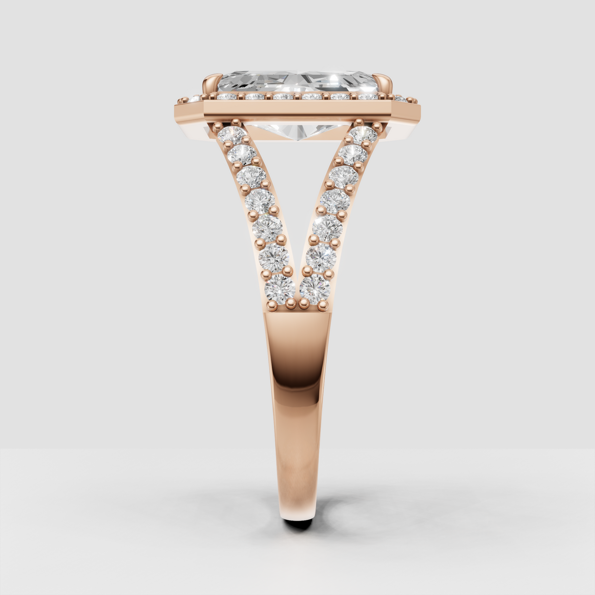 Radiant diamond engagement ring with open cathedral under-gallery