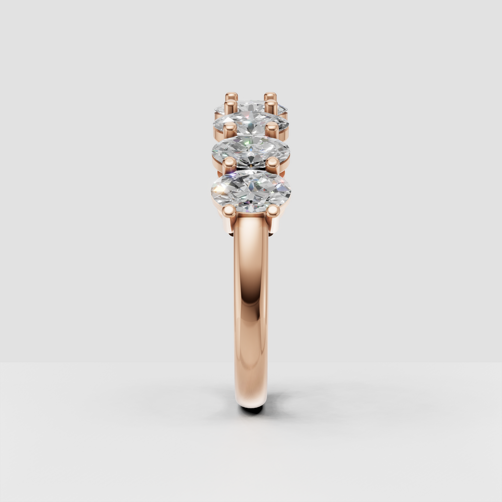 Timeless oval diamond band with shared prong setting and continuous stone coverage