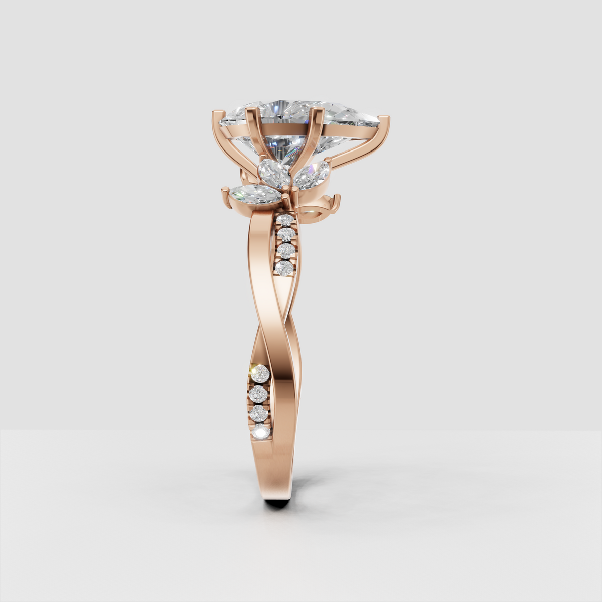 Pear shaped diamond ring with split band and sparkling diamond shoulders