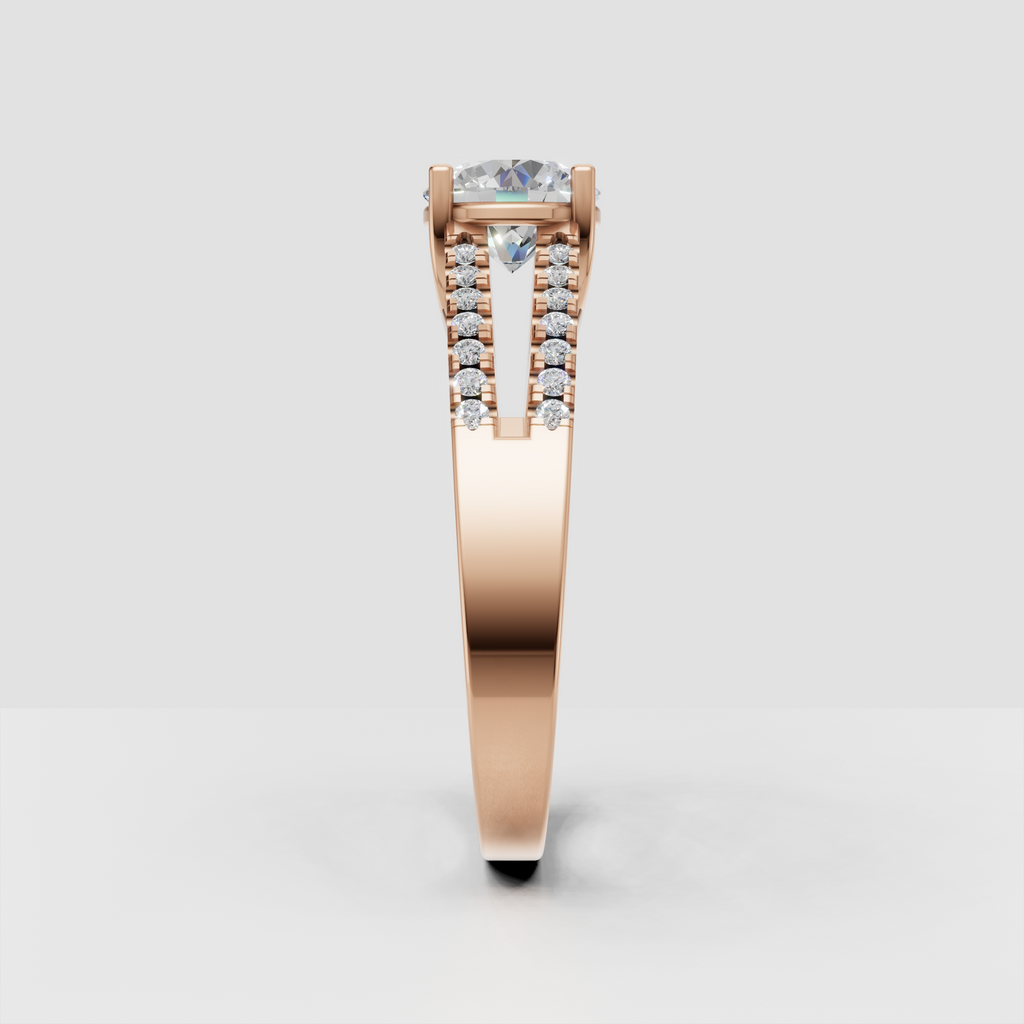 Side profile of yellow gold round Diamond engagement ring with open gallery