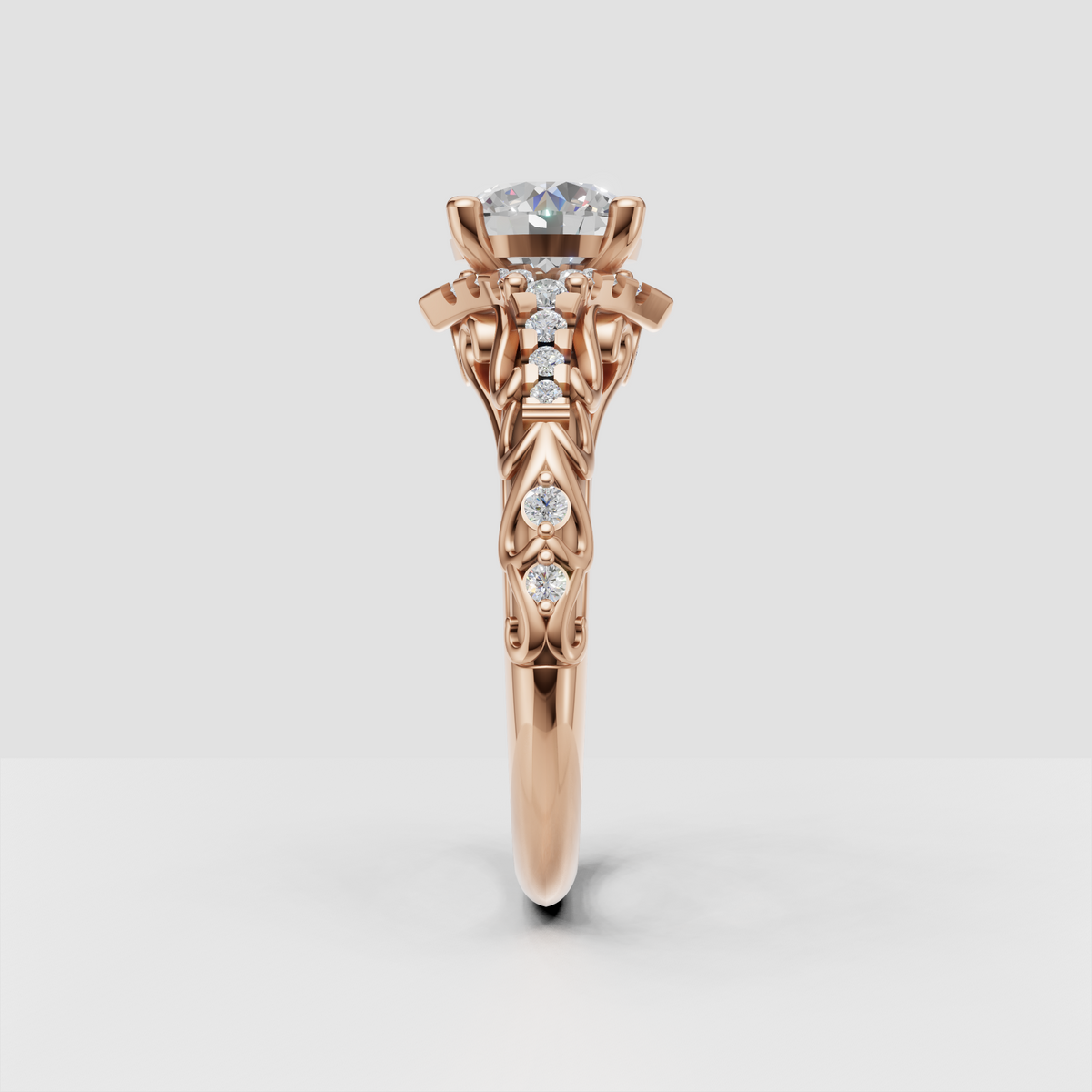 Romantic round diamond engagement ring with vintage scrollwork detailing