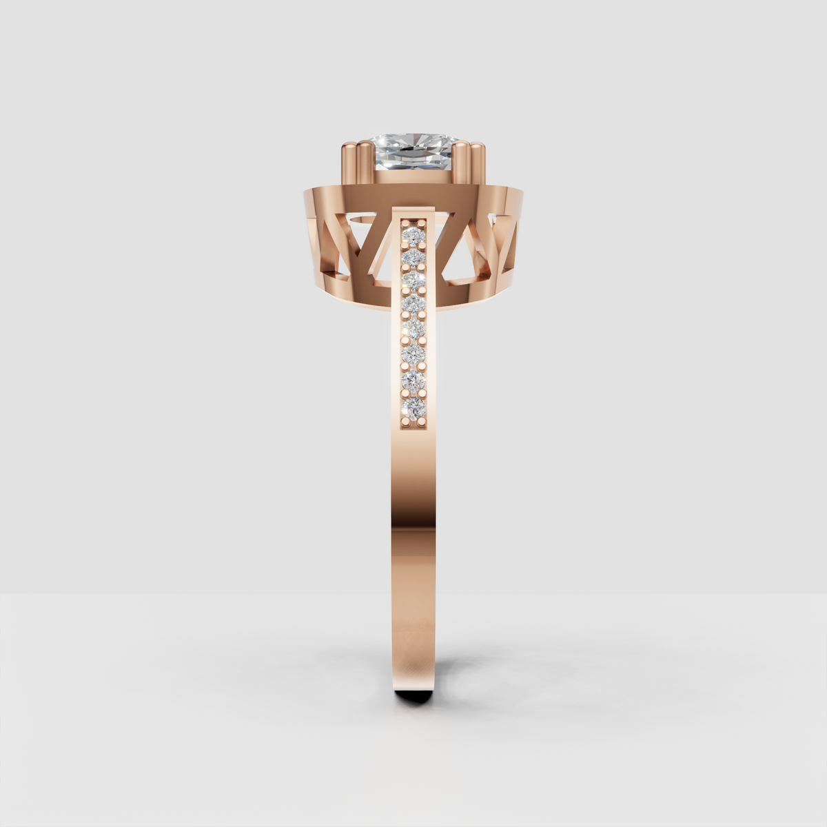 Yellow gold halo ring featuring cushion center stone and pavé diamonds