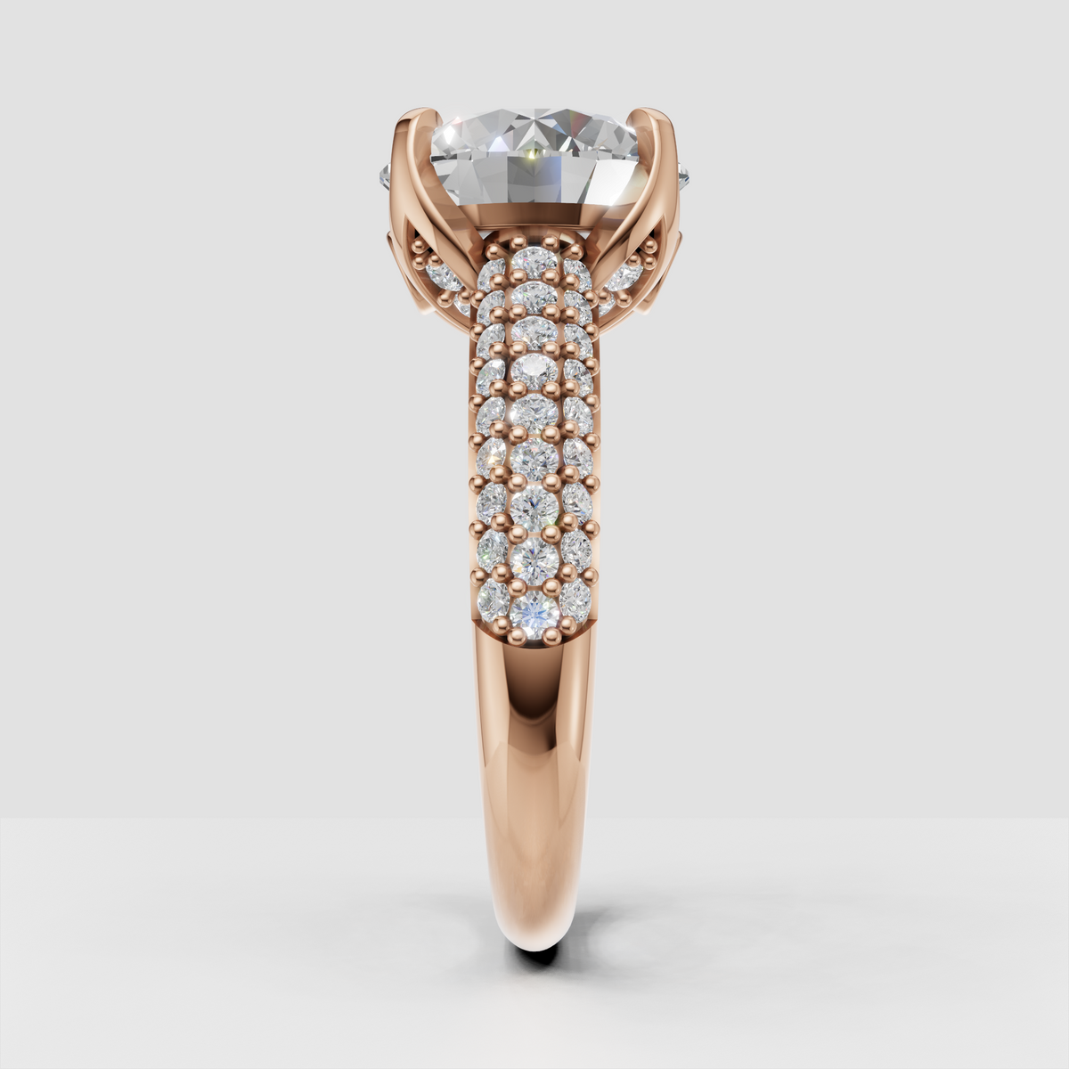 Round cut diamond ring with sculptural four-prong vintage setting
