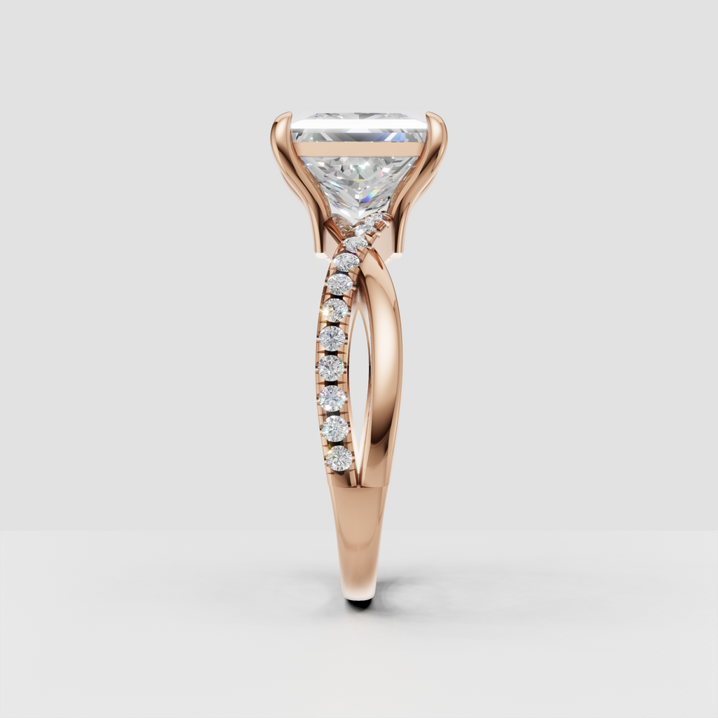 Contemporary princess cut diamond ring with sparkling shoulder accents