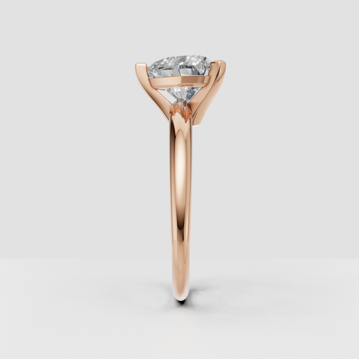 Minimalist heart cut diamond engagement ring with polished yellow gold band