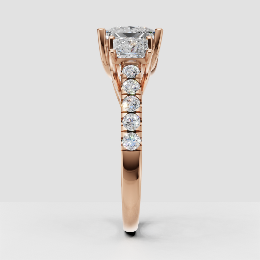 Princess cut diamond ring with square side stones and round accents