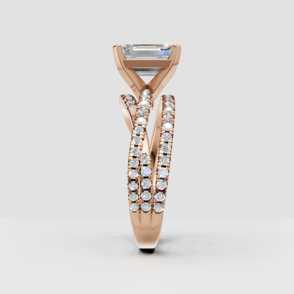Pavé split shank emerald cut diamond engagement ring side view
