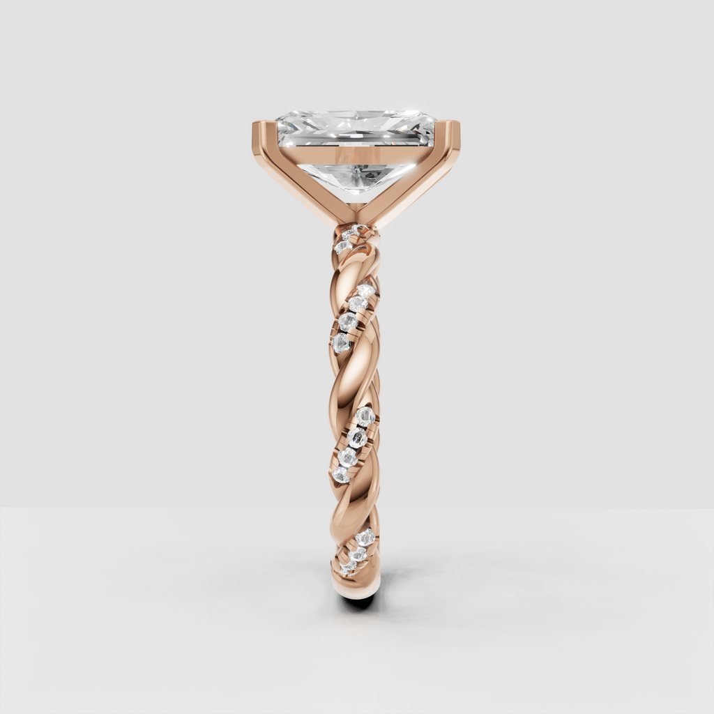 Yellow gold twisted engagement ring with radiant cut center diamond